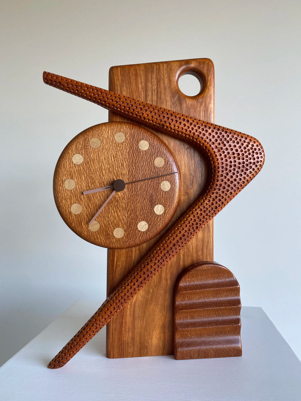 Sculptural clock (boomerang) - Victor & Wills by Victor & Wills