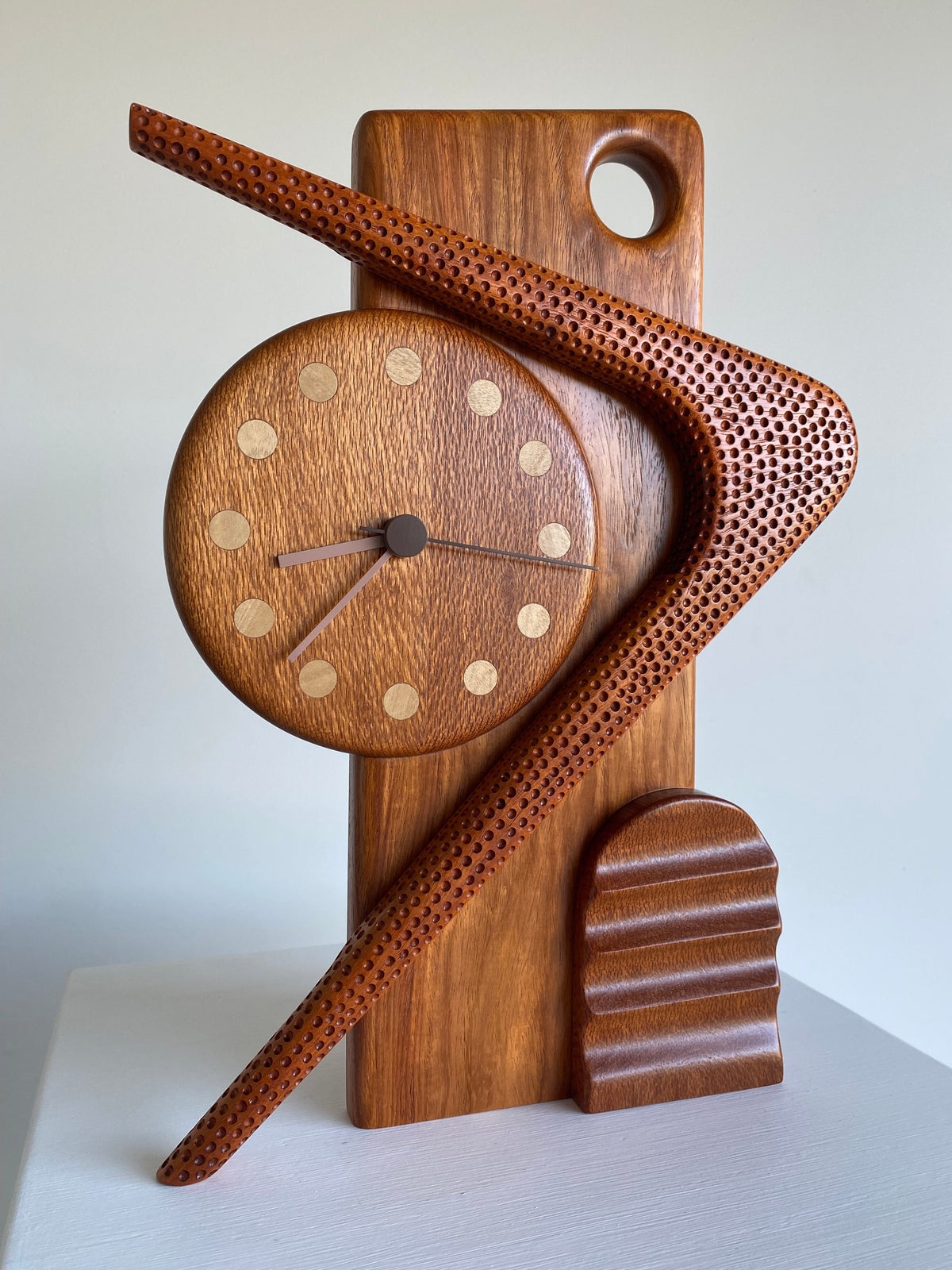 Sculptural clock (boomerang) - Victor & Wills by Victor & Wills