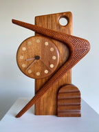 Sculptural clock (boomerang) - Victor & Wills by Victor & Wills