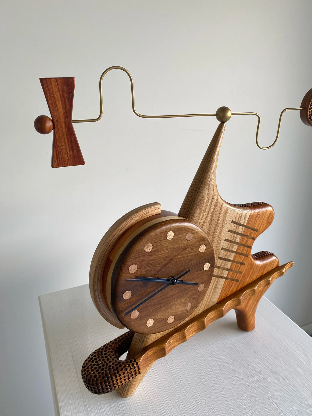Sculptural clock/wind mobile - Victor & Wills by Victor & Wills