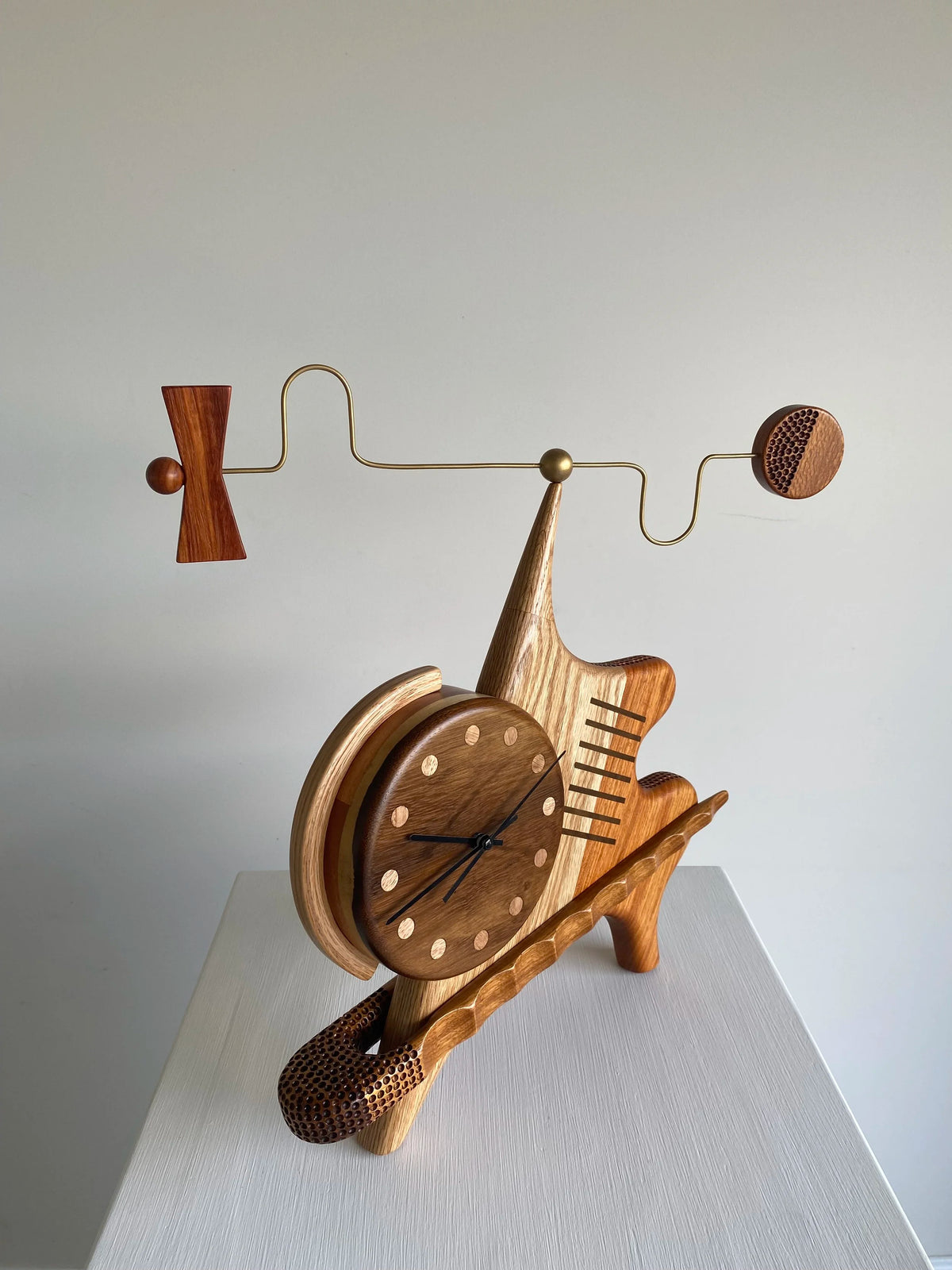 Sculptural clock/wind mobile - Victor & Wills by Victor & Wills