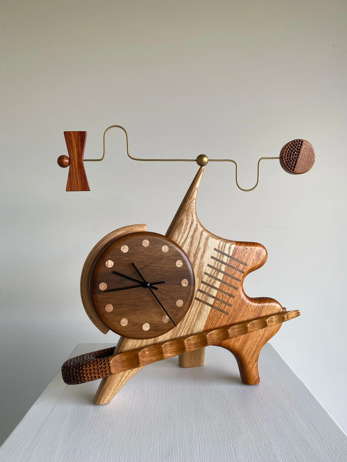 Sculptural clock/wind mobile - Victor & Wills by Victor & Wills