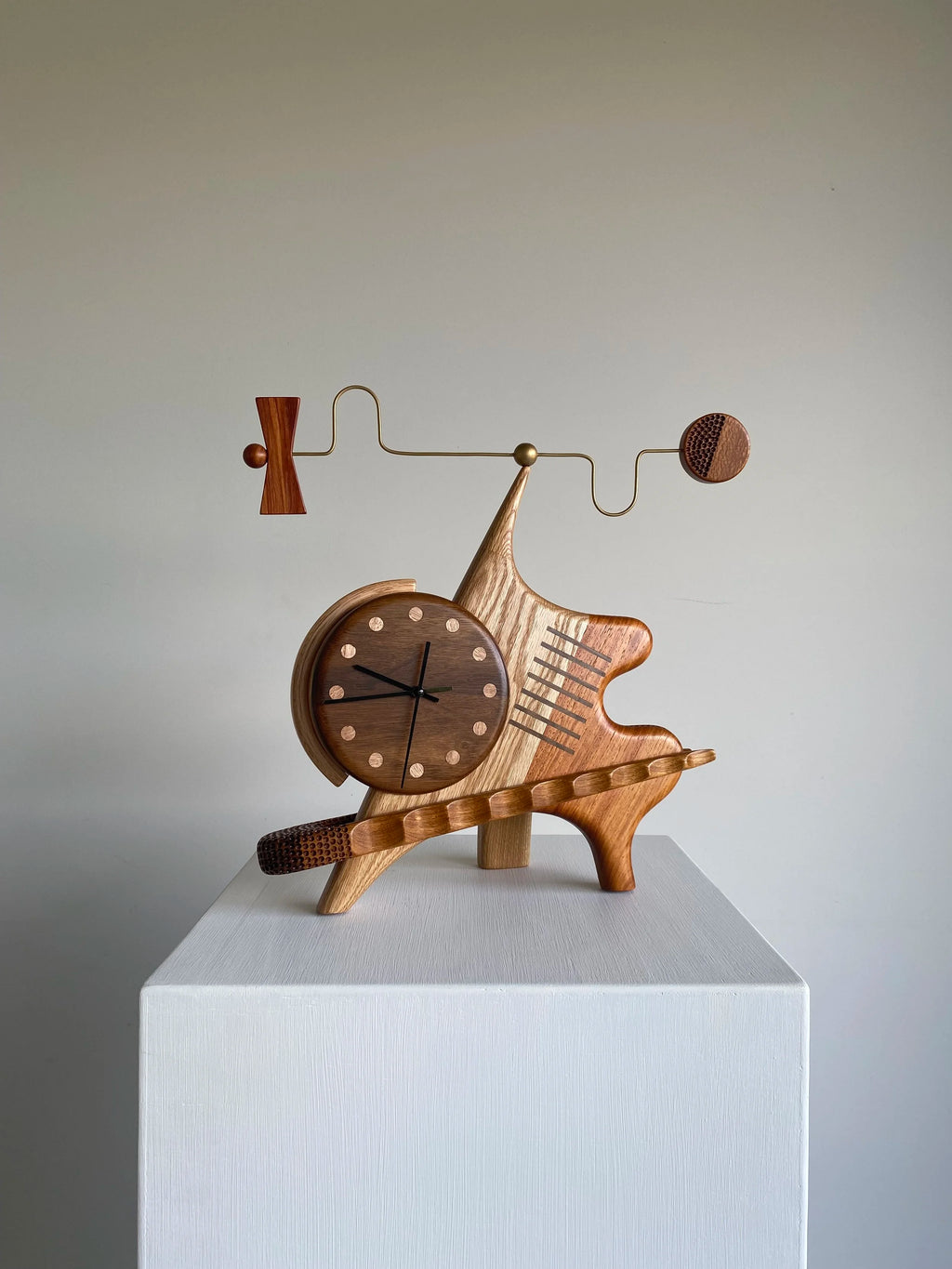 Sculptural clock/wind mobile - Victor & Wills by Victor & Wills